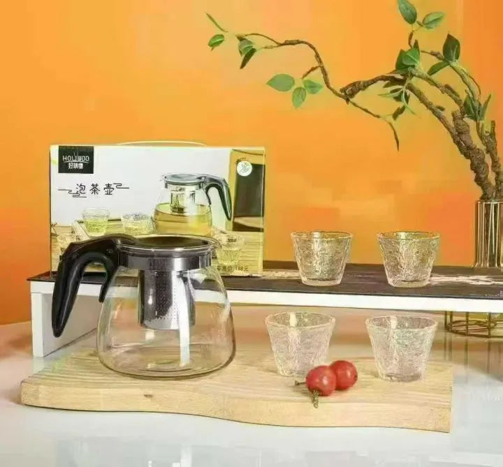 طقم إبريق شاي زجاج وأربعة أكواب